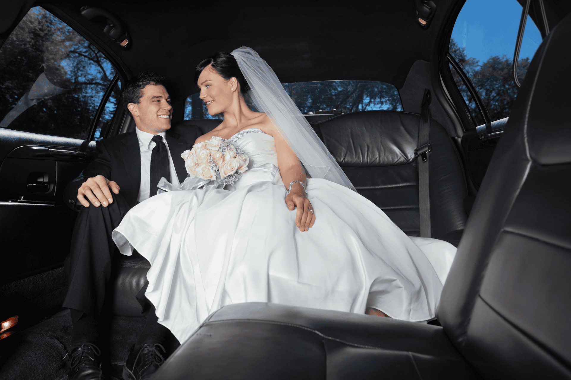 bride-and-groom-in-limo